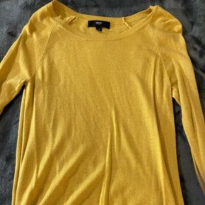 yellow sweater